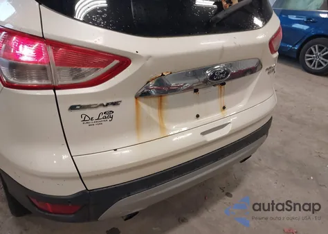 2014 Ford Escape Titanium z USA, uszkodzony, nr VIN 1FMCU9JX7EUC35881